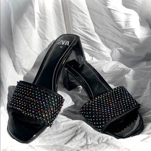 Black heeled sandal with colourful studs